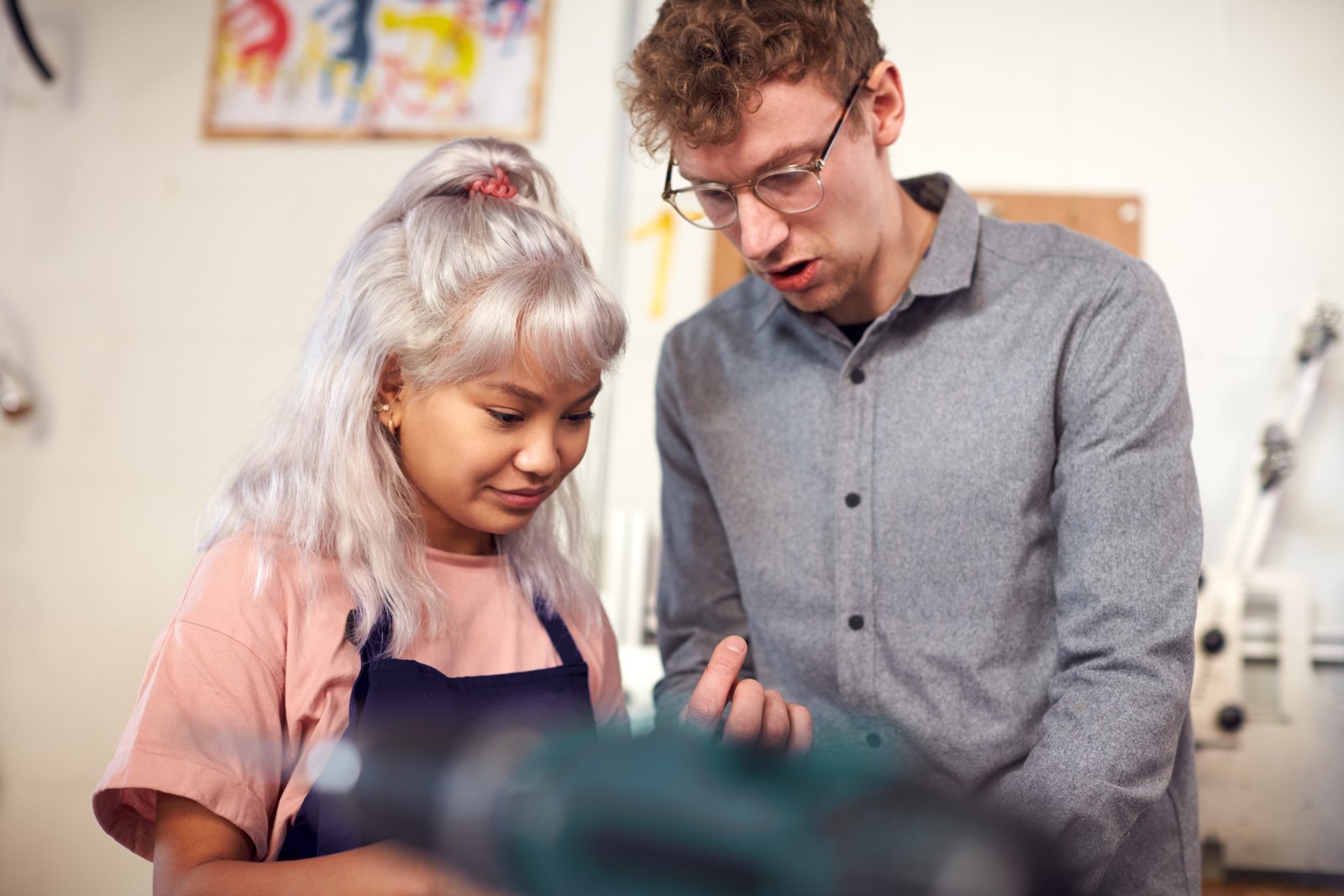 Student and mentor working together in a workshop