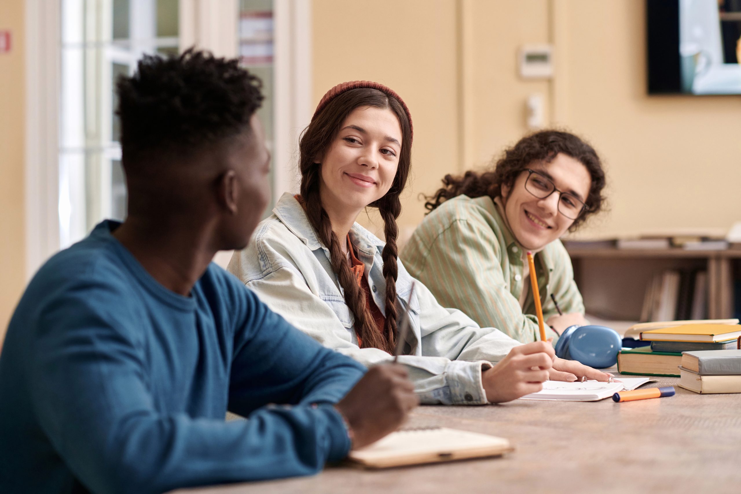Students collaborating at a desk